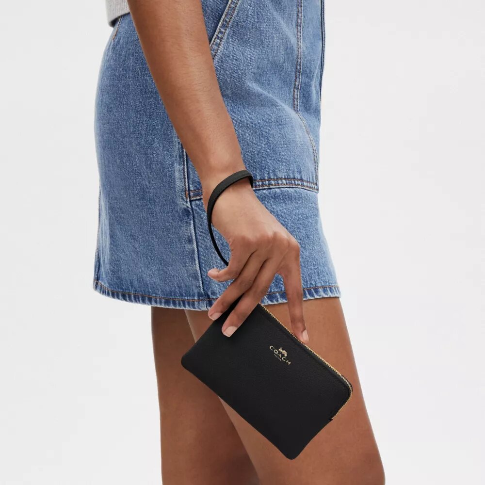 Handgelenktasche mit Reißverschluss an der Ecke