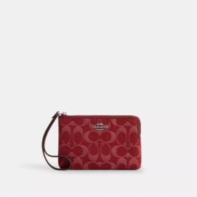 Handgelenktasche mit Reißverschluss an der Ecke aus charakteristischem Denim