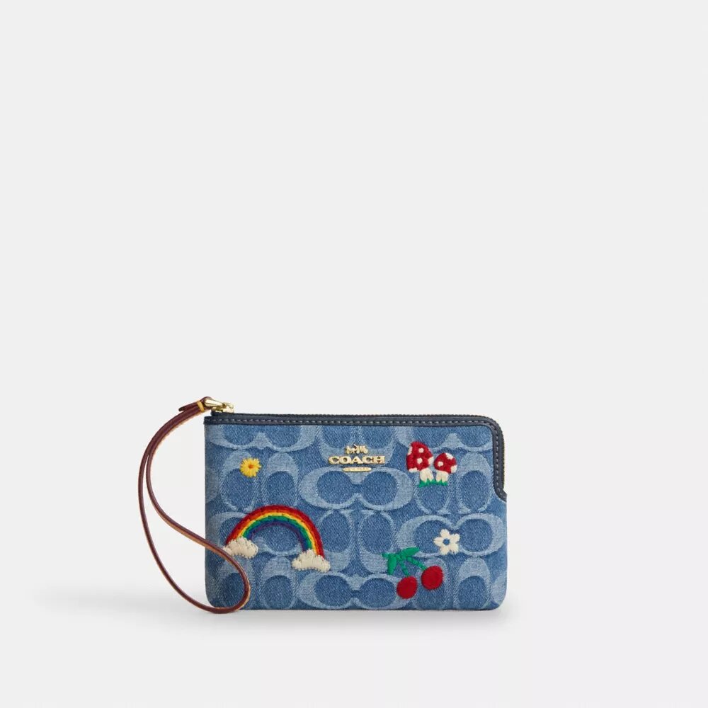Handgelenktasche mit Reißverschluss an der Ecke aus charakteristischem Denim