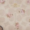 Handgelenktasche mit Reißverschluss an der Ecke aus Signature Canvas mit Blumenprint