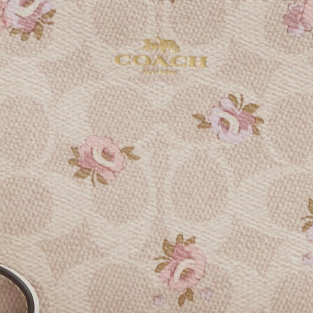 Handgelenktasche mit Reißverschluss an der Ecke aus Signature Canvas mit Blumenprint