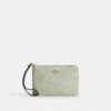 Handgelenktasche mit Reißverschluss an der Ecke und Blumenmuster