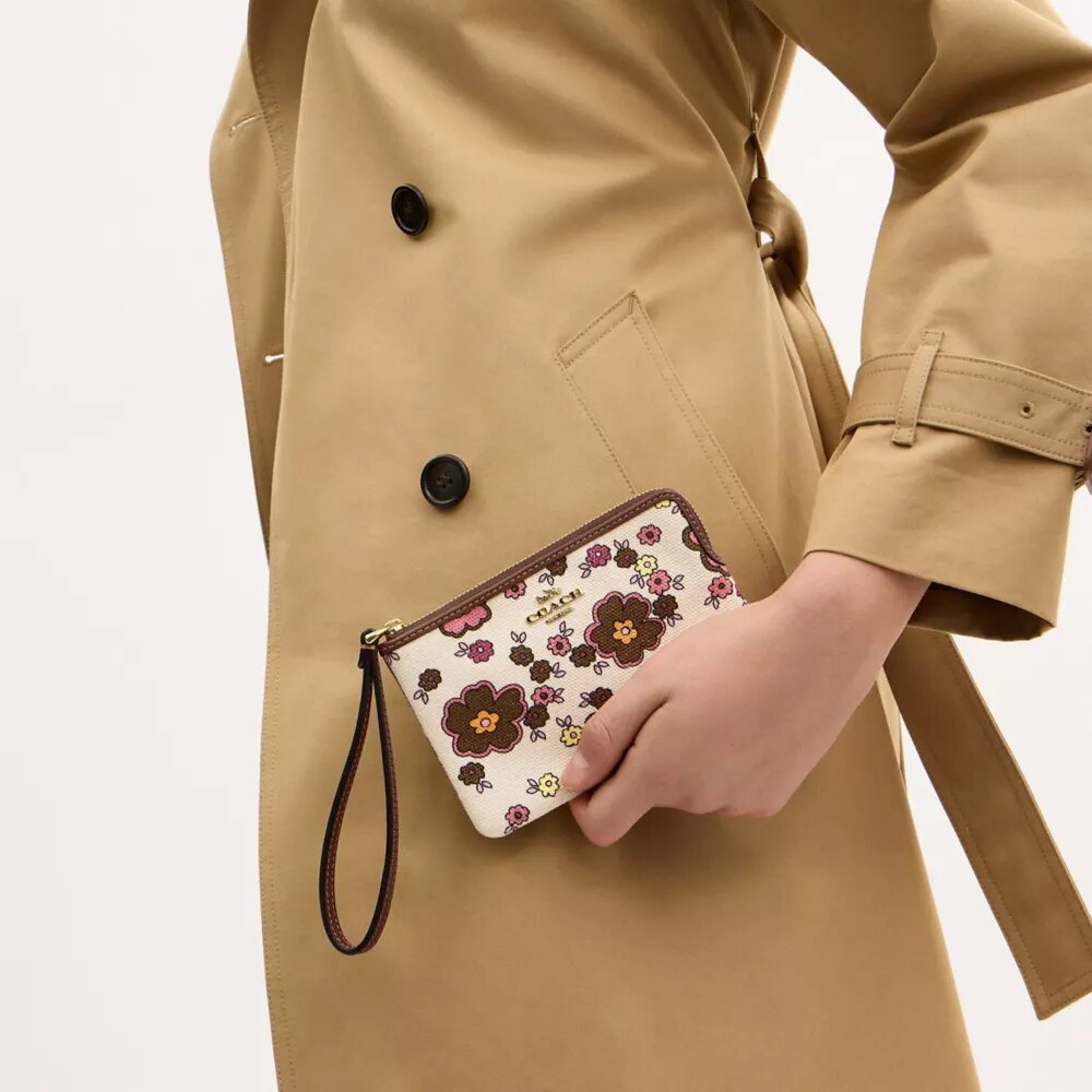 Handgelenktasche mit Reißverschluss an der Ecke und Blumenmuster