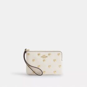 Handgelenktasche mit Reißverschluss an der Ecke und Herz-Nieten