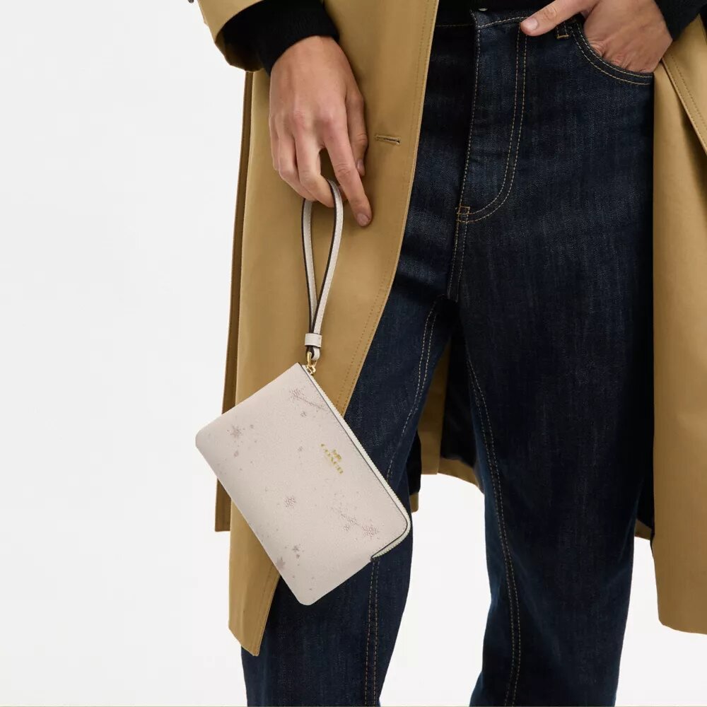 Handgelenktasche mit Reißverschluss an der Ecke und Sternenprint