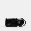 Handgelenktasche und Herztäschchen mit Anhänger