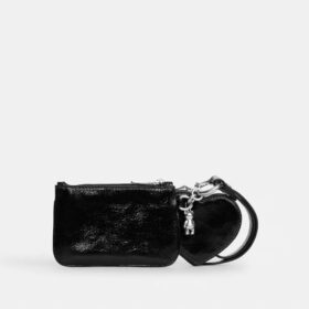 Handgelenktasche und Herztäschchen mit Anhänger