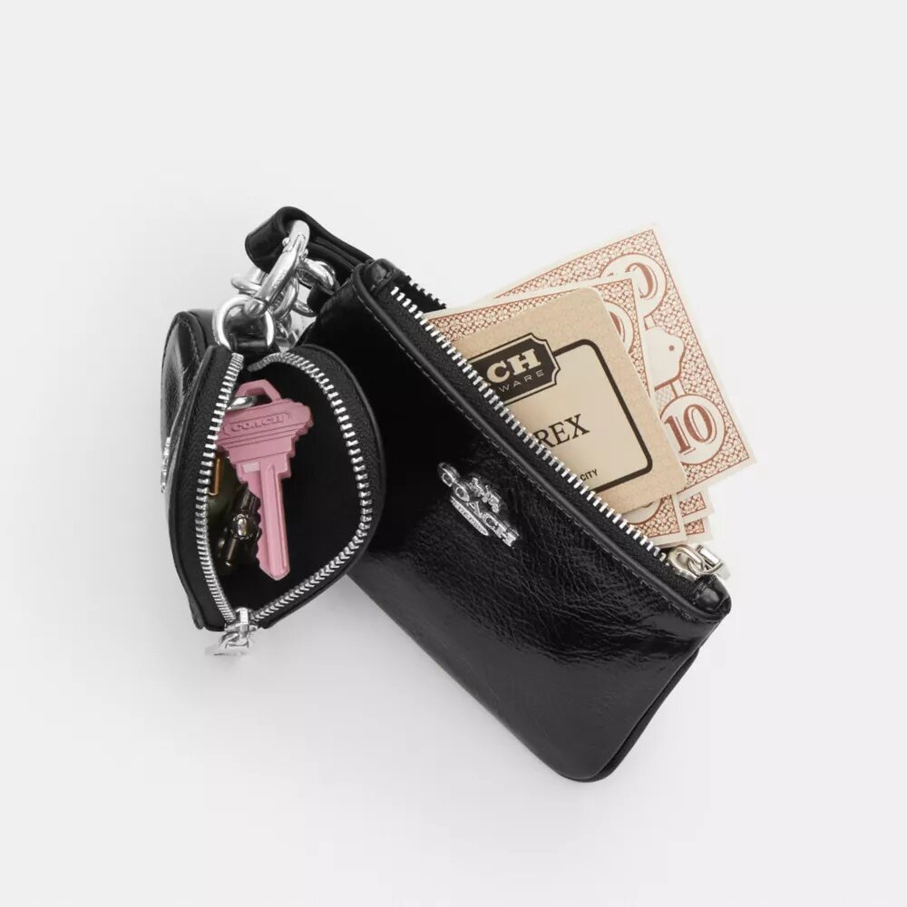 Handgelenktasche und Herztäschchen mit Anhänger