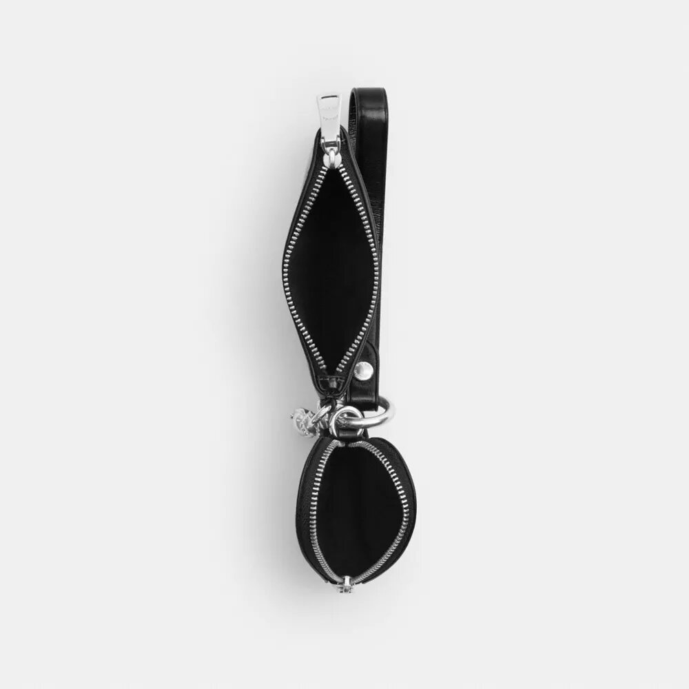 Handgelenktasche und Herztäschchen mit Anhänger