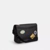 Hitch-Messenger-Tasche aus Signature Canvas mit Aufnähern