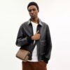 „Jack Small Flap Umhängetasche“ aus Signature Canvas