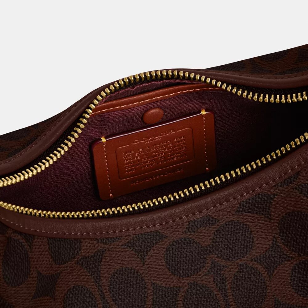 Juliet-Schultertasche 25 aus Signature Canvas