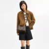 Juliet-Schultertasche 25 in Signature-Jacquard