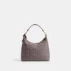 Juliet-Schultertasche 38 in charakteristischem Jacquard