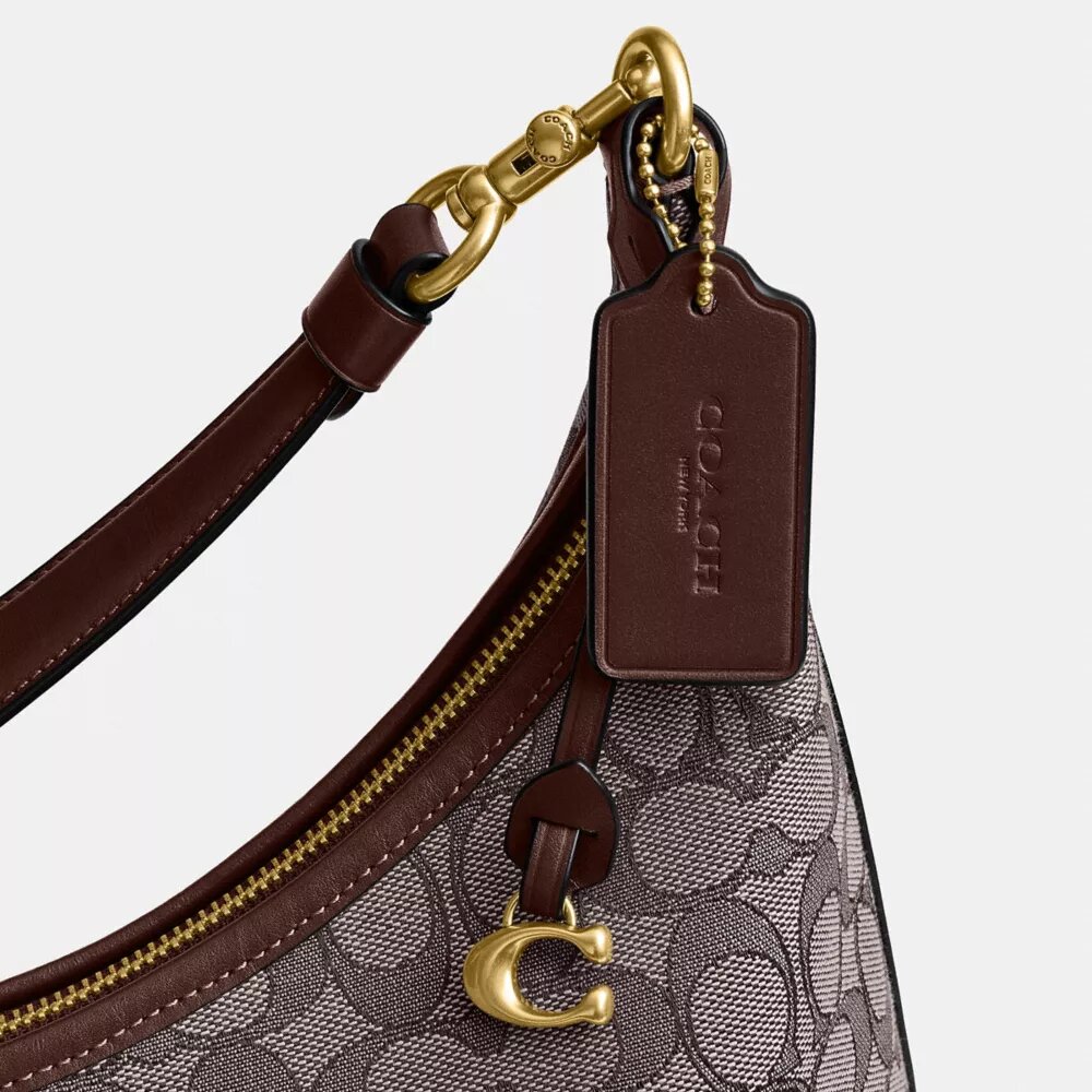 Juliet-Schultertasche 38 in charakteristischem Jacquard
