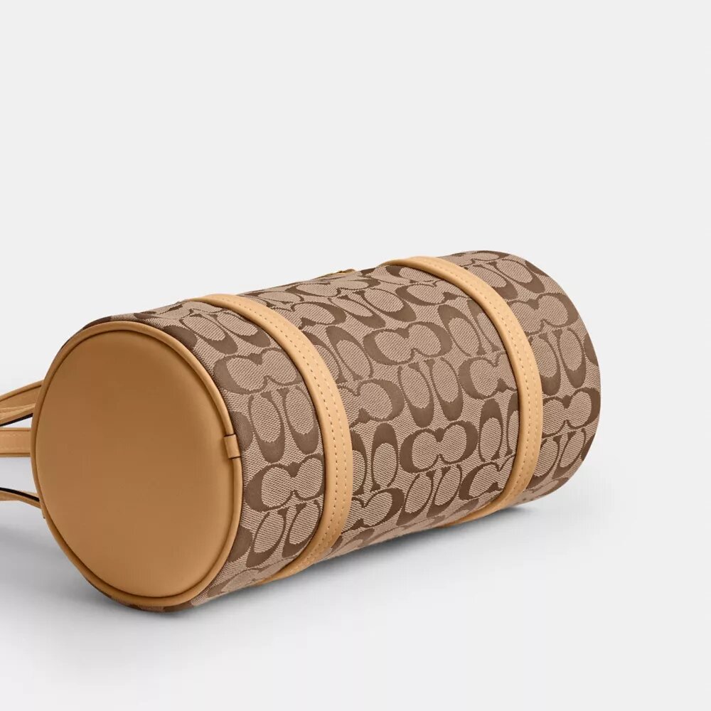 Kisslock Barrel Bag 28 aus Signature-Jacquard