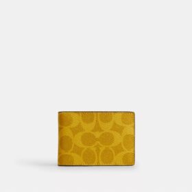 Kompakte Geldbörse aus „Signature Canvas“