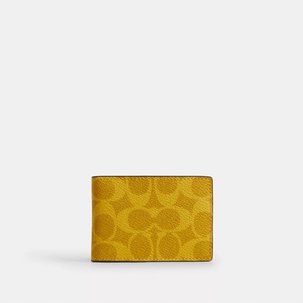 Kompakte Geldbörse aus „Signature Canvas“