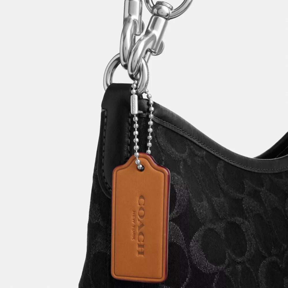 Laurel-Schultertasche aus charakteristischem Denim