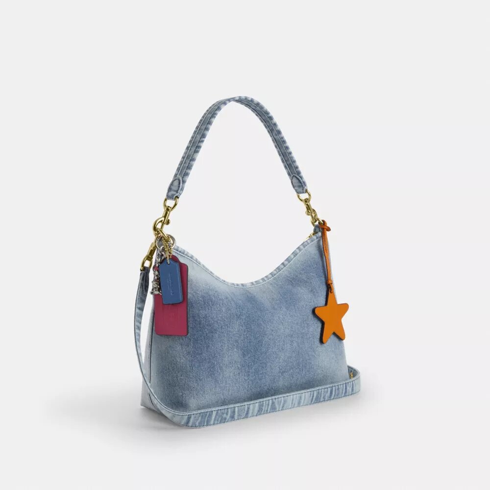Laurel-Schultertasche aus Loved Denim mit Anhängern