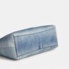 Laurel-Schultertasche aus Loved Denim mit Anhängern
