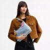 Laurel-Schultertasche aus Loved Denim mit Anhängern
