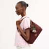 Laurel-Schultertasche mit Anhängern