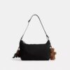 Leo Crossbody aus Signature-Nylon mit Anhängern