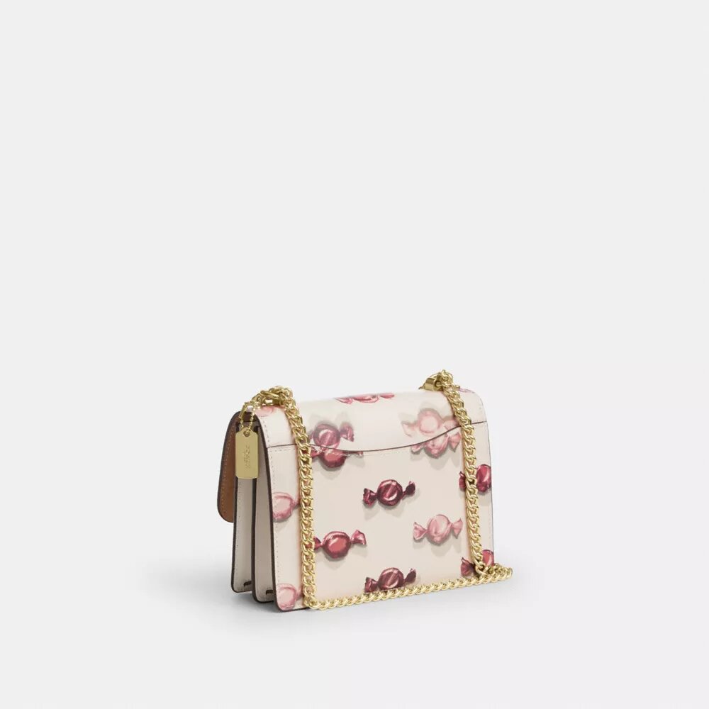 Mini-Klare-Umhängetasche mit Bonbon-Print