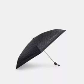 Mini-Regenschirm mit UV-Schutz im charakteristischen Print