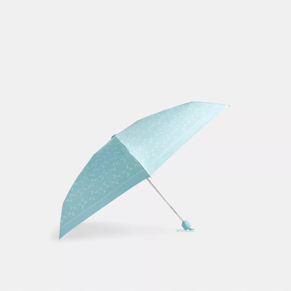 Mini-Regenschirm mit UV-Schutz im charakteristischen Print