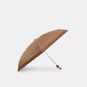 Mini-Regenschirm mit UV-Schutz im charakteristischen Print