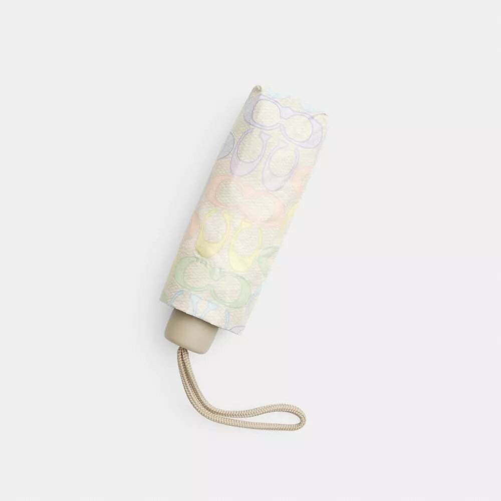 Mini-Regenschirm mit UV-Schutz im „Rainbow Signature“-Print