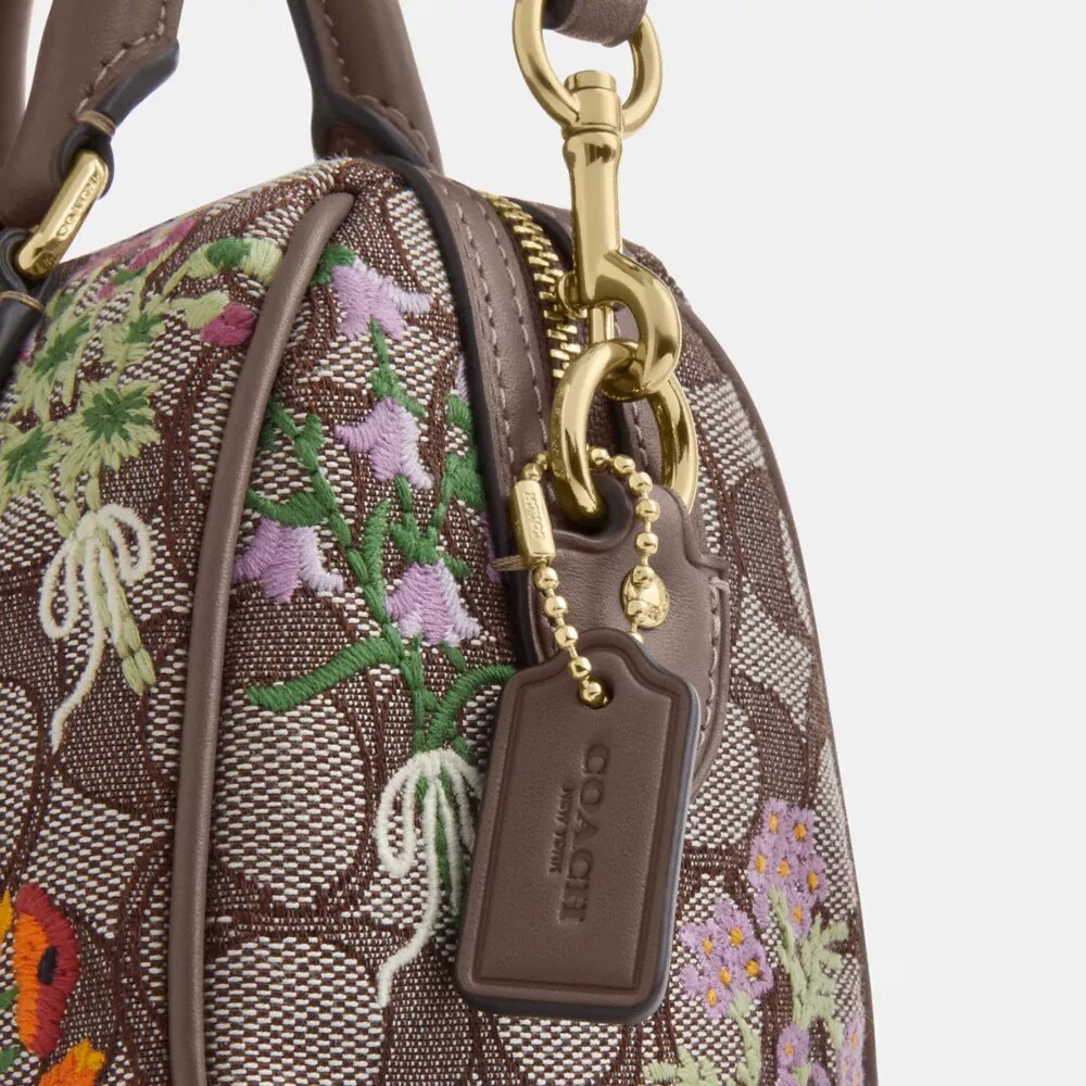 Mini-Rowan-Umhängetasche aus charakteristischem Jacquard mit Blumenstickerei