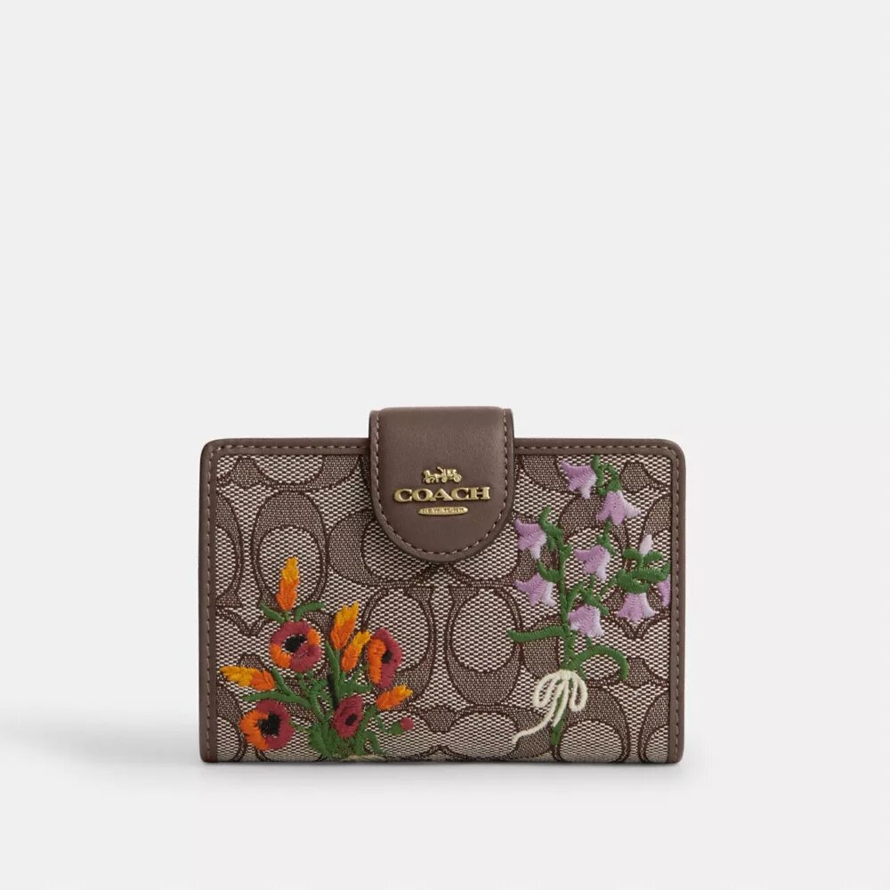 Mittlere Eck-Geldbörse mit Reißverschluss aus charakteristischem Jacquard mit Blumenstickerei