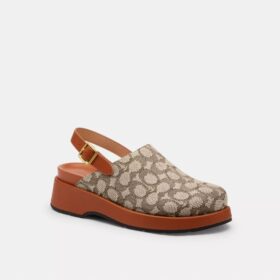 Plateau-Clogs mit geformter C-Platte aus unserem charakteristischen Jacquard-Textil