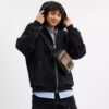 Racer Sling Pack aus Signature Canvas