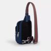 Racer-Sling-Rucksack mit Varsity-Streifen-Gurtband