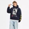 Relaxed-Fit-Kapuzenpullover mit Dinosaurier-Collage aus Bio-Baumwolle