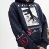 Relaxed-Fit-Kapuzenpullover mit Dinosaurier-Collage aus Bio-Baumwolle