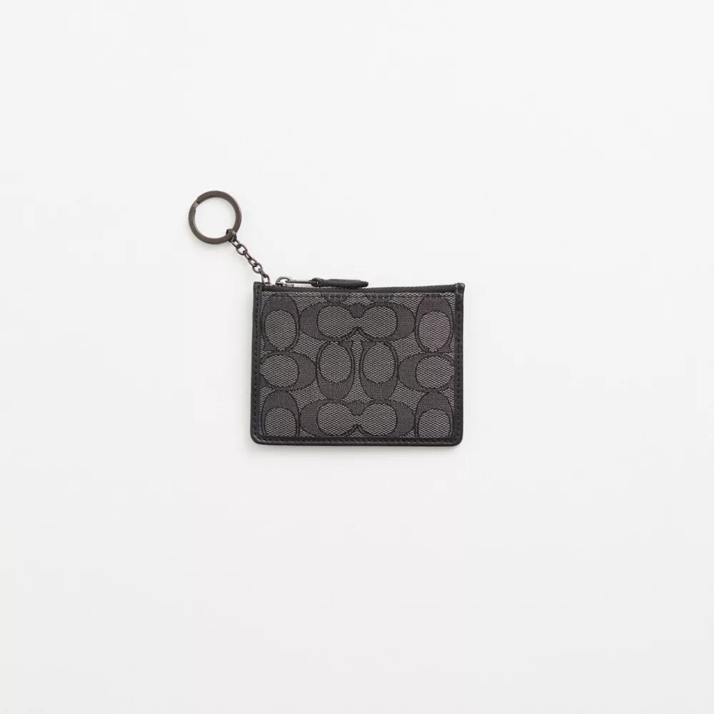 Restauriertes Mini Skinny ID-Etui aus charakteristischem Textil-Jacquard