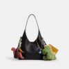 Rexy 10. Geburtstag Brooklyn-Schultertasche 28 mit Anhängern