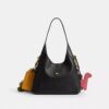Rexy 10. Geburtstag Brooklyn-Schultertasche 28 mit Anhängern