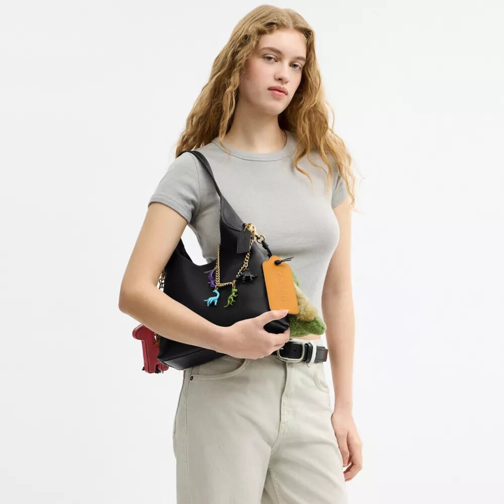 Rexy 10. Geburtstag Brooklyn-Schultertasche 28 mit Anhängern
