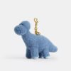Rexy 10. Geburtstag – „Buddy Dinosaur“-Taschenanhänger aus Lammfell
