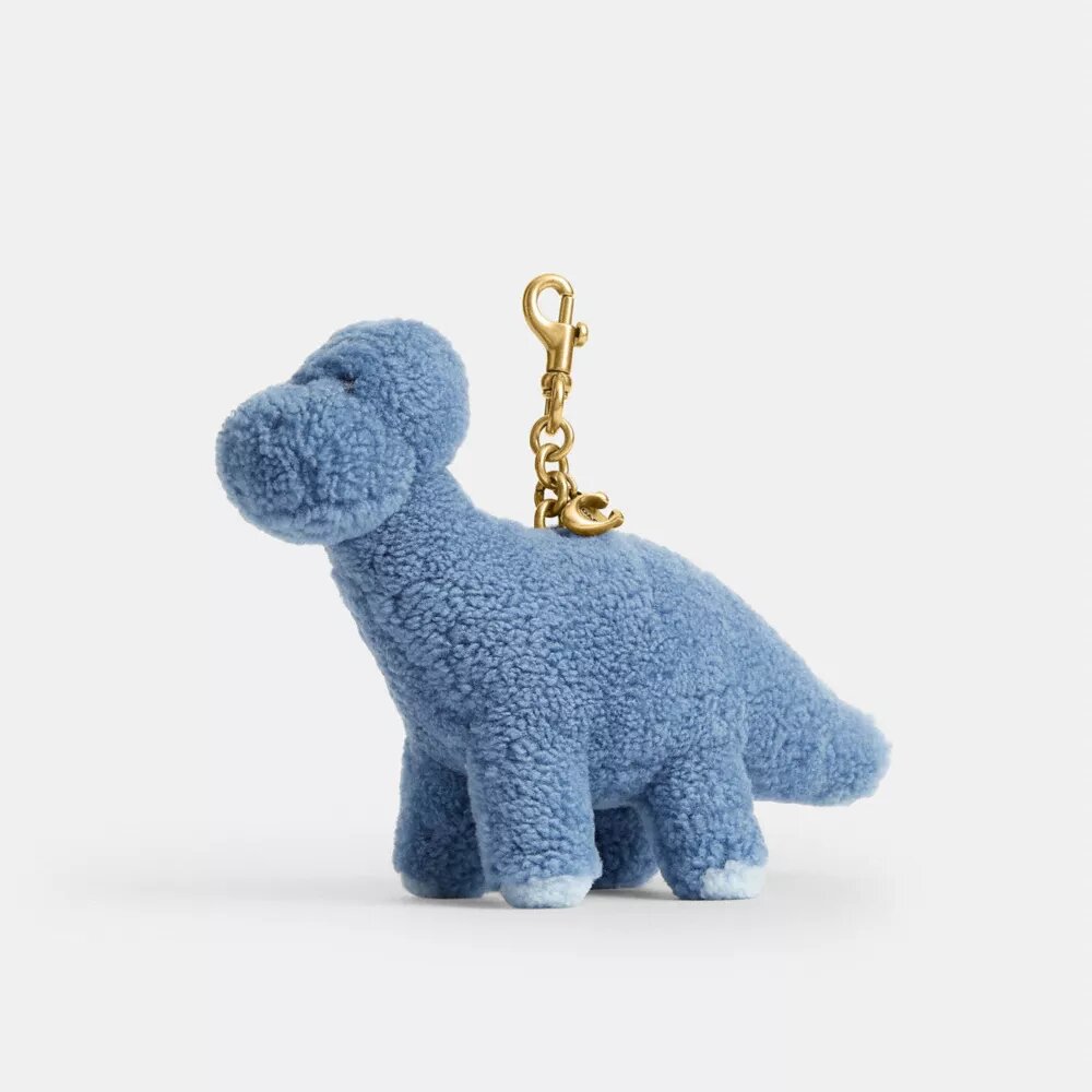 Rexy 10. Geburtstag – „Buddy Dinosaur“-Taschenanhänger aus Lammfell