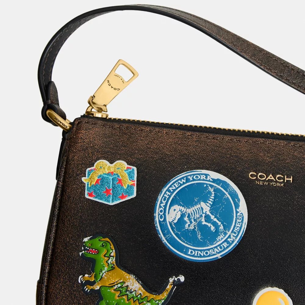 Rexy 10. Geburtstag – „Plaza“-Tasche 18 in „Loved Leather“ mit Aufkleber-Print