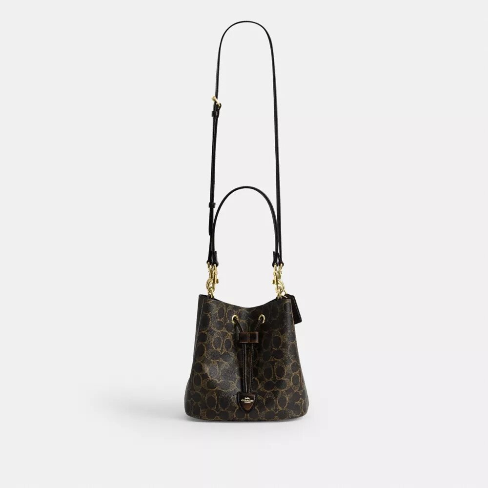 Rowan-Beuteltasche aus „Loved“ Signature Canvas mit Anhängern