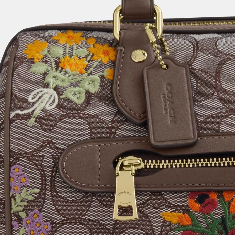 Rowan-Umhängetasche aus charakteristischem Jacquard mit Blumenstickerei