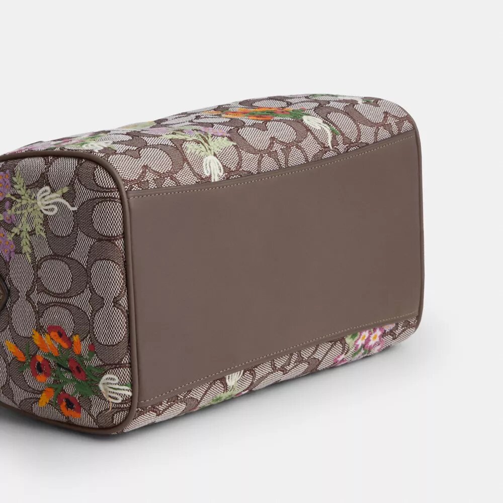 Rowan-Umhängetasche aus charakteristischem Jacquard mit Blumenstickerei